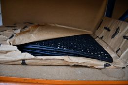 A set of four as new Coco Mats in black.