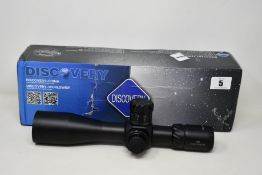 A Discovery Optics HD FFP 4-24X50 SFIR Rifle Scope.