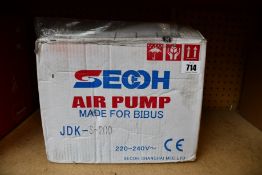 A SECOH JDK-S-200 Air Pump.