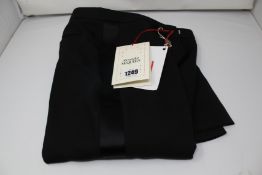 A pair of as new Alexander McQueen trousers (TG 46).