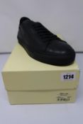 A pair of as new Axel Arigato Clean 90 Croc sneakers (UK 9.5).
