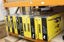 Six as new Zanussi Handy Go 2 in 1 handy rechargeable vacuums (4x red and 2x blue).