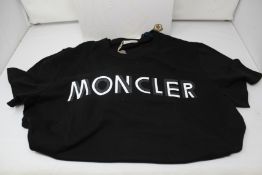 An as new Moncler Maglia T-shirt (L).