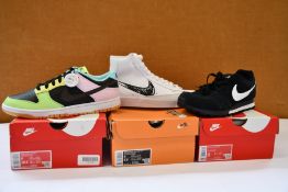Three pairs of as new Nike trainers; Dunk Low SE (UK 8), MD Runner 2 (UK 8) and Blazer Mid