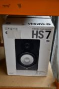 A Yamaha HS7 Powered Studio Monitor.