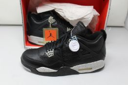 A pair of as new Nike Air Jordan 4 Retro LS with authentication tag (UK 9 - No box lid).