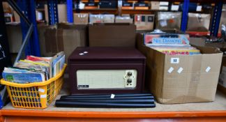 A Large quantity of vinyl records and a Bush wooden turntable with legs.