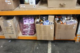 Two boxes of assorted toiletries and luxury beauty items and a box of cosmetic bags and related