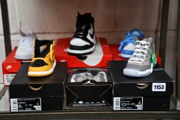 Six pairs of toddlers/children's/youth assorted as new Nike trainers.