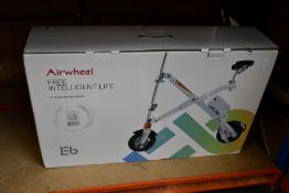 An Airwheel E6 Foldable Electric Bike in black.