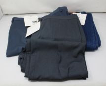 A pair of Sandro slim fit deep blue jeans (Size 32), a pair of Sandro Pluto trousers in