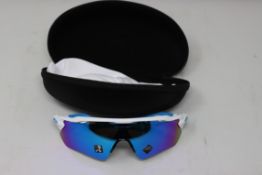 A pair of as new Oakley Radar EV Path sunglasses.