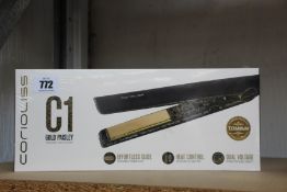 An as new Corioliss C1 professional hair styling iron in Gold Paisley.
