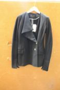 An as new Proenza Schouler Asymmetrical Lapel blazer in black (Size US 4 - RRP £693).