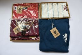 Four assorted Football Town retro football shirts together with a hoodie.