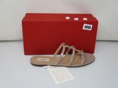 A pair of as new Valentino Garavani slides (EU 42 - RRP £490).