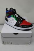A pair of women's as new Nike Air Jordan 1 Mid SE (UK 9.5).