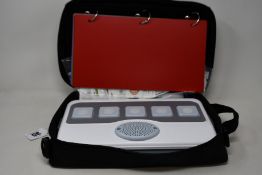 An as new LoganTech Proxtalker device with blank programmable cards for verbal picture communication