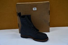 A pair of as new Origin boots (US 13).