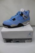 A pair of as new Nike Air Jordan 4 Retro with authentication tag (UK 8.5).