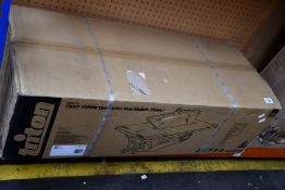 A boxed as new Triton TWX7 1800W Contractor Saw Module.