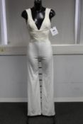 An as new Galvan London Hampstead jumpsuit in off white (UK 6).