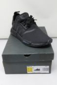 A pair of as new Adidas NMD_R1 (UK 10).