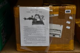 A JMY8-70 Circular Saw Blade Grinder (UK adaptor required).