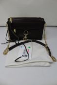 A pre-owned Rebekah Minkoff bag (Excellent condition).