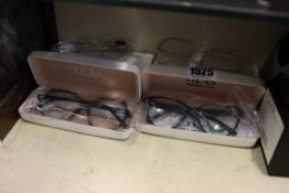 Four pairs of as new Glas reading glasses.