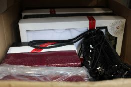 A box of Baylis and Harding gift sets and body/hand lotions.