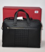 An as new Salvatore Ferragamo Gancini business bag in calf leather (RRP from £1,350).