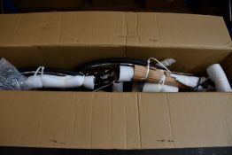 An as new SAVA bicycle in black and grey (Note: This item is still packed in the box and model is