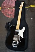 A pre-owned Fender Squire Telecaster Bigsby electric guitar with carry case.