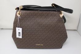 An as new Michael Kors Raven bag.