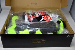 A pair of youths boxed as new Alpine Stars Tech 3S Off-road Boots in back, white and fluorescent