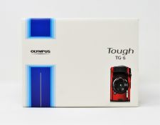 A boxed as new Olympus Tough TG-6 Digital Camera in Red (UK plug included).
