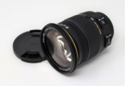 A boxed as new Sigma AF 17-50mm f/2.8 EX DC OS HSM for Nikon AF D.