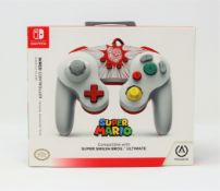 Four boxed as new PowerA Nintendo Game Cube Style Wired Controllers for Nintendo Switch in Mario