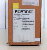 A boxed as new Fortinet FortiGate 100E Firewall Device (M/N:FG-100E-BDL-950-60 P/N: P18827-04-18) (