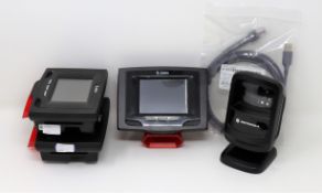 A pre-owned Motorola DS9208 Barcode Scanner with as new cable and three pre-owned Zebra MK590