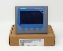 A boxed as new Siemens Simatic KTP400 Basic HMI Panel (P/N: 6AV2123-2DB03-0AX0) (Box opened).