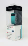 Fifteen boxed as new Fitbit Charge HR Heart Rate and Activity Trackers in Teal (Size Large) (Boxes