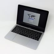 SOLD FOR PARTS: A pre-owned Apple MacBook Pro 13