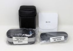 An as new X-Rite eXact Basic Handheld NGH Spectrophotometer (NGHXRN20U) with UK power supply,