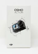 A boxed as new DJI Osmo Action 4K Camera (M/N: AC001) (Box sealed).