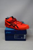 A pair of as new Asics Javelin Pro trainers (UK 8).