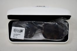 A pair of as new Calvin Klein sunglasses.