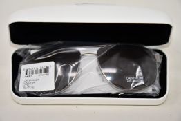 A pair of as new Calvin Klein sunglasses.