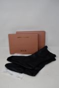 A pair of as new Wolford x Amina Muaddi vegan leather socks (L - RRP £184).